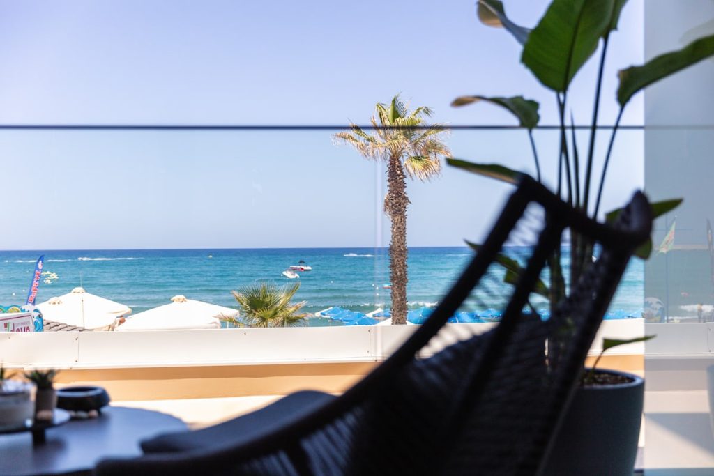 A balcony chair overlooking the sea