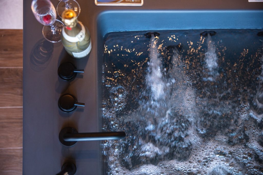 Bubbles and champagne in the Sea View Suite jacuzzi
