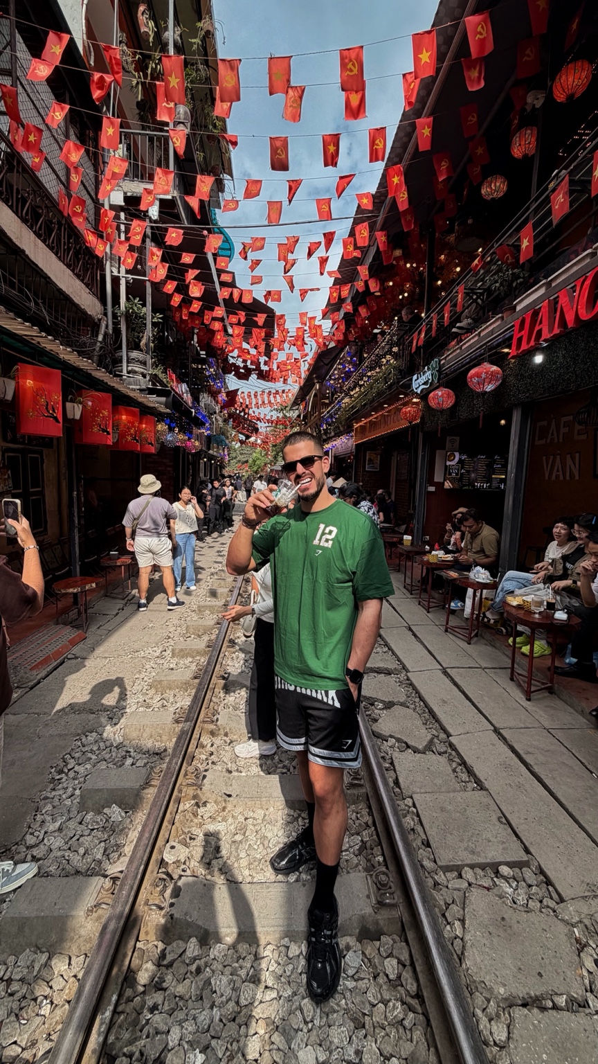Fotis exploring a lively street on his travels