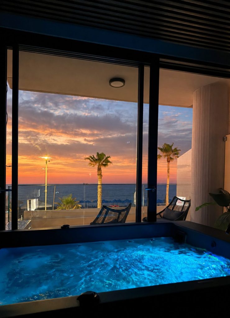 Sunset colours beyond the indoor jacuzzi